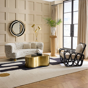  Brass Orb Feet Curved Sofa | Oroa.com